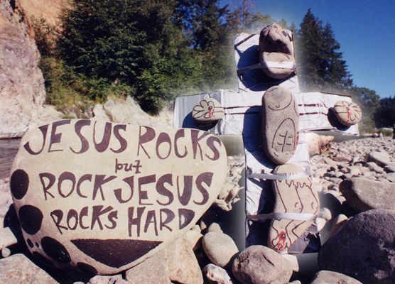 Jesus Rocks but Rock Jesus Rocks Hard Reggae on the River 2002 Sharpie Sculpture of rock depicting Savior with duct tape by Matthew Flansburg with LIT FUZE Choir member Remay White fLANSBURG dESIGN